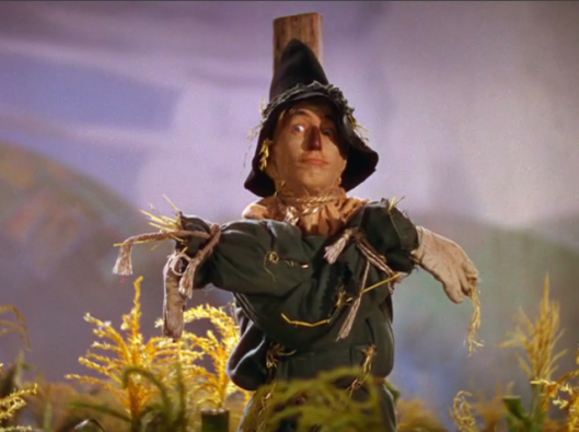 scarecrow with gun in wizard of oz